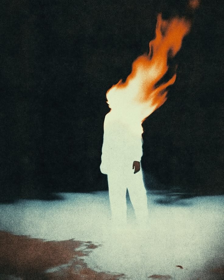 Figure in mist with fire